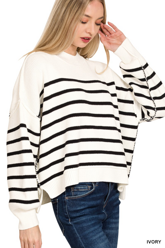 Exposed seam striped oversized sweater
